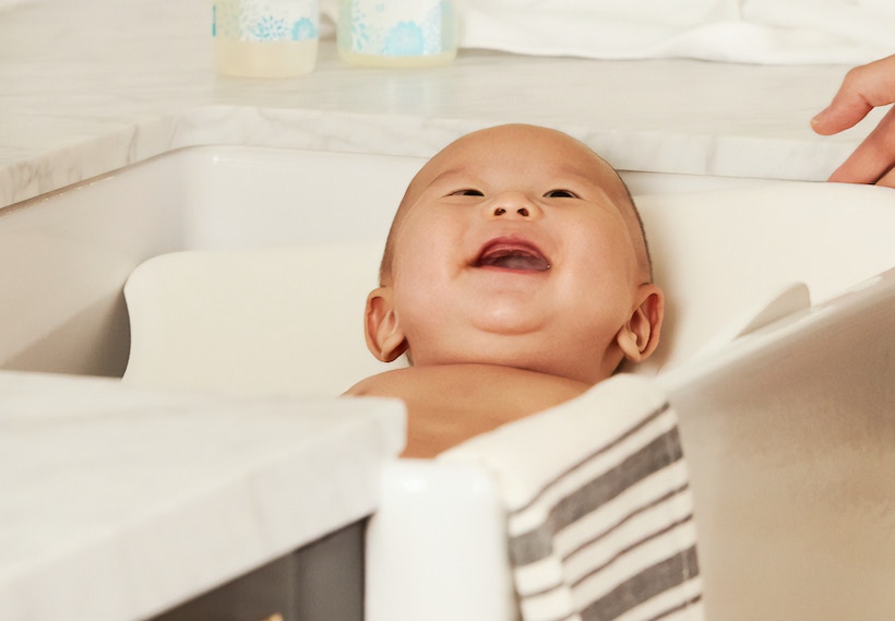 Baby looking up and laughing