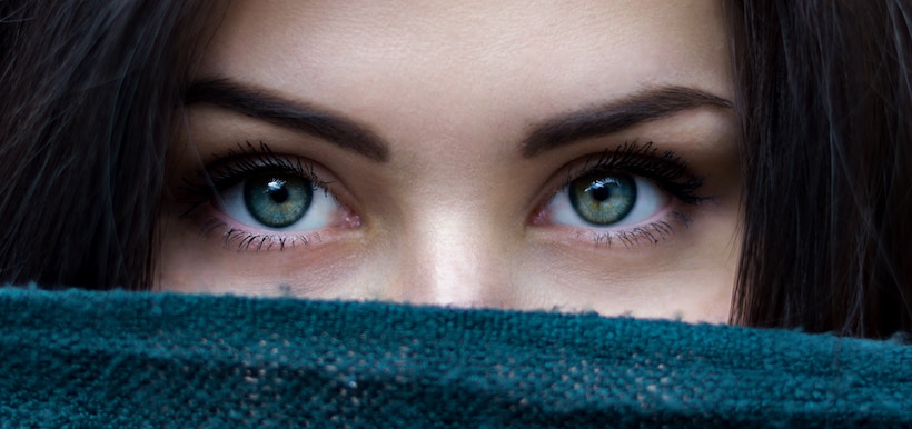 Lady with beautiful blue and green eyes