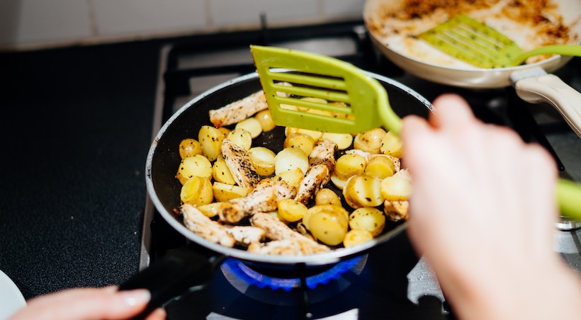 Frying potatoes in a small pan