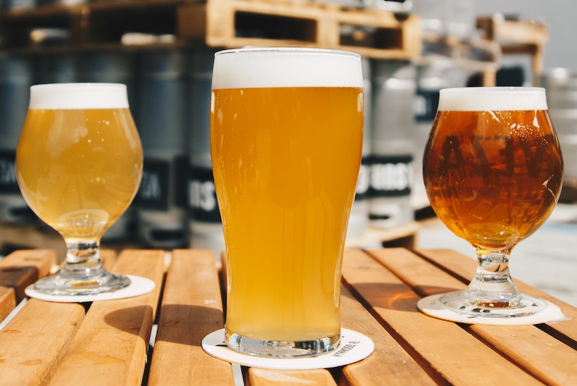 Three glasses of beer on a table