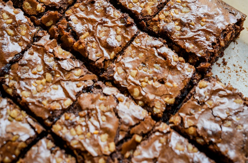 Brownies on baking sheet after cutting