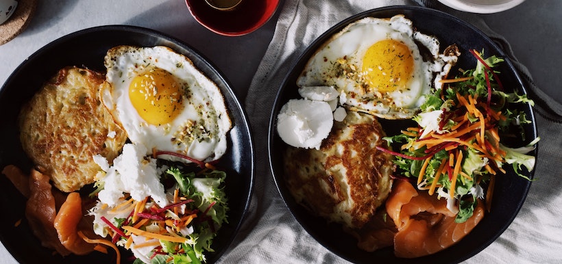 Eggs, toast, and salad on cast iron