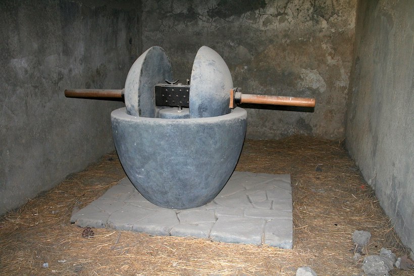 Picture of a stone olive press for making olive oil