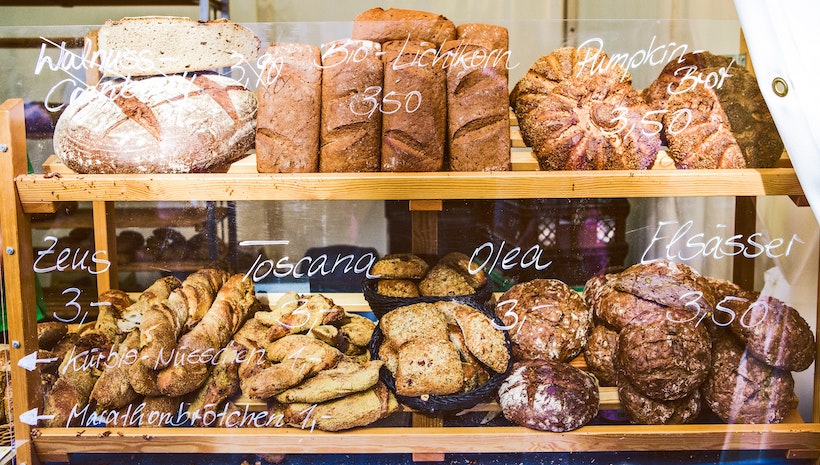 Bread at a bakery with wax crayon prices and names