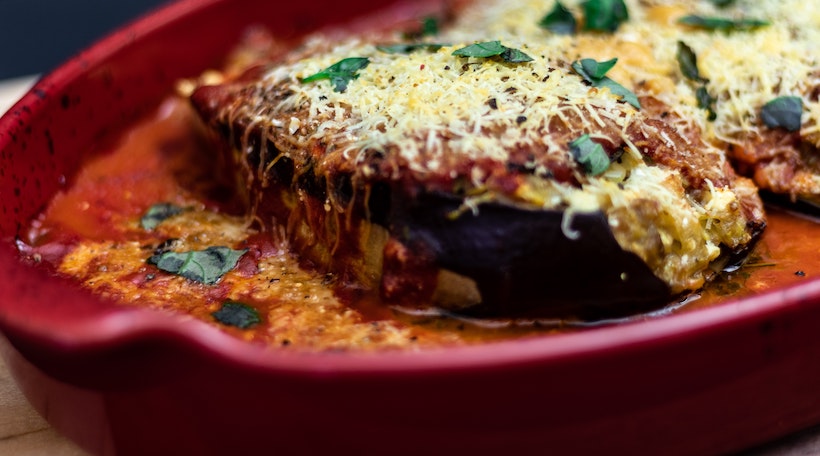 Fried eggplant with cheese on top