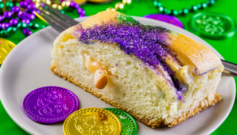 King cake slice with a plastic baby inside